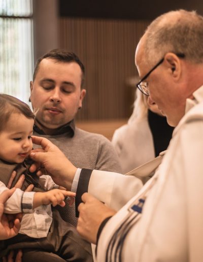 Reportážní fotografie focená svatebním fotografem Fotky s duší na křtinách v Brně.